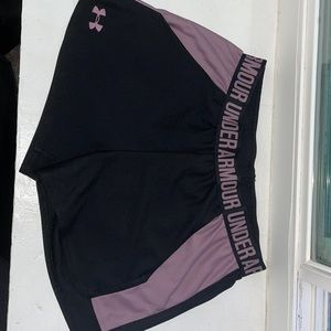 Purple and black Under Armour shorts